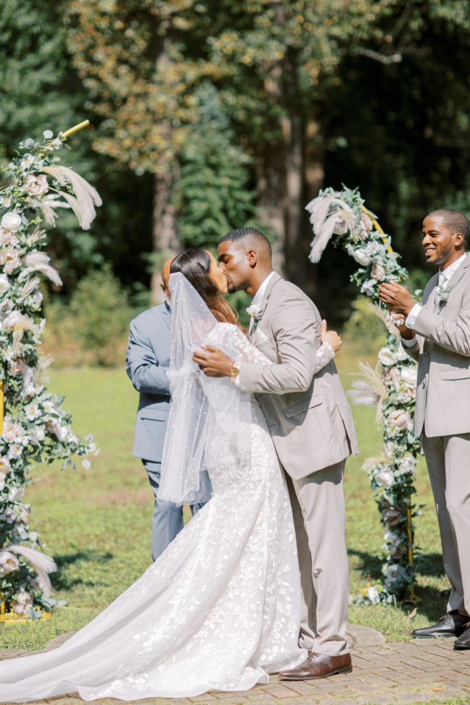 Atlanta-Wedding-Photographer-Cator-Woolford-Gardens-Renee-Jael_groom_wedding_ceremony_first kiss