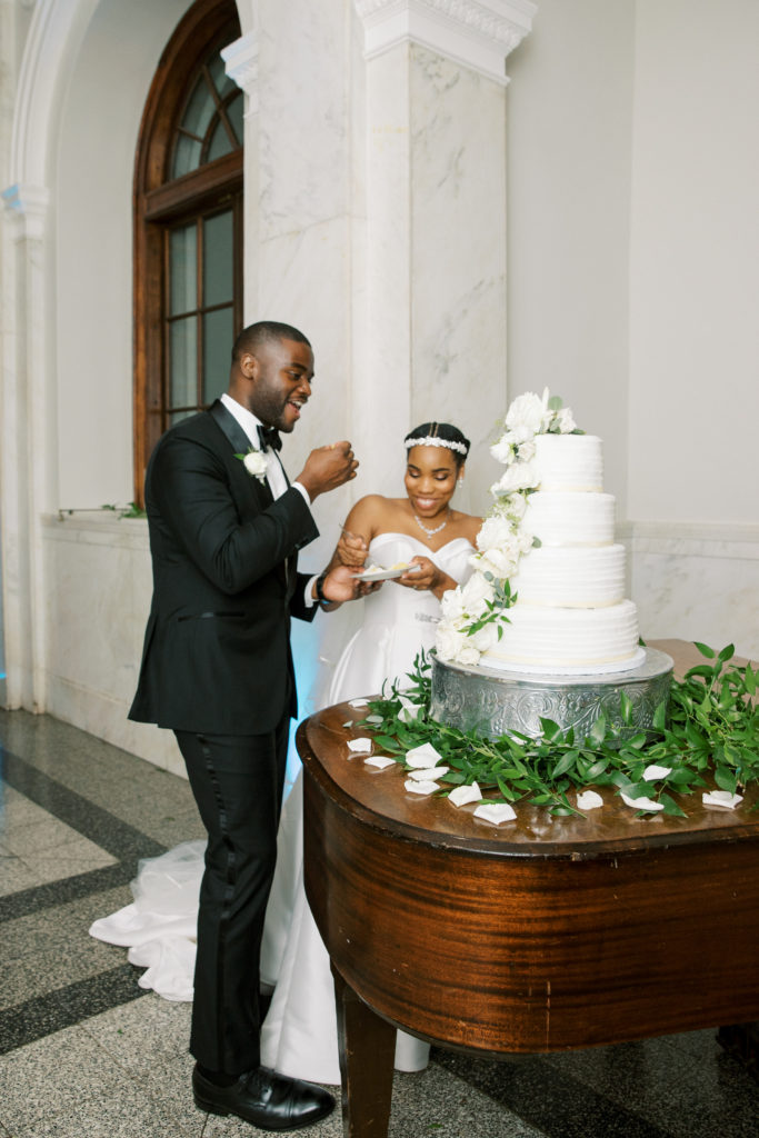 Renee-Jael-Atlanta-Wedding-Photographer-at-Dekalb-History-Center-and-Courthouse-Anya-Bridal-cake-cutting